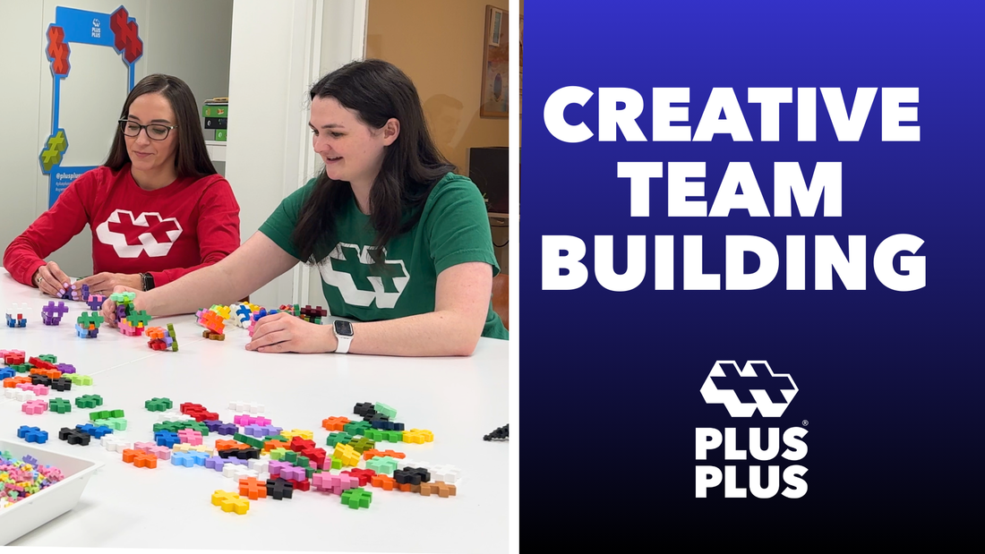 two plus-plus staff working on team building activity with Plus-Plus blocks