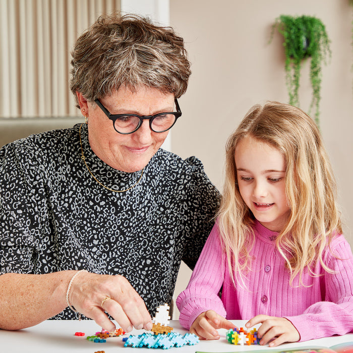 Learn to Build - Colorverse: adult and child building together