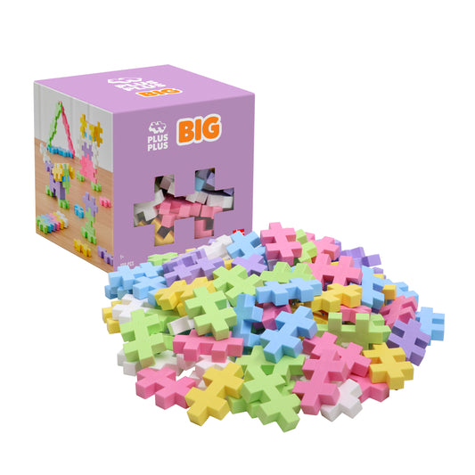 Plus-Plus BIG 100 pc Pastel Mix box with a pile of pastel BIG pieces