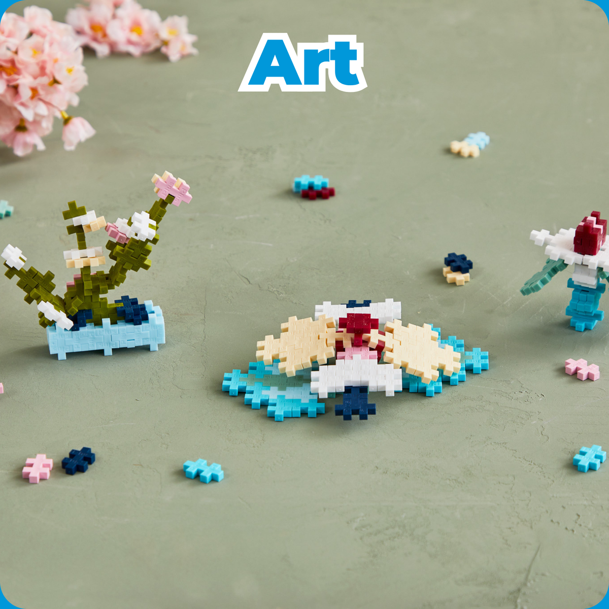 Shop by Theme - Art: Plus-Plus flower and garden builds on a green surface