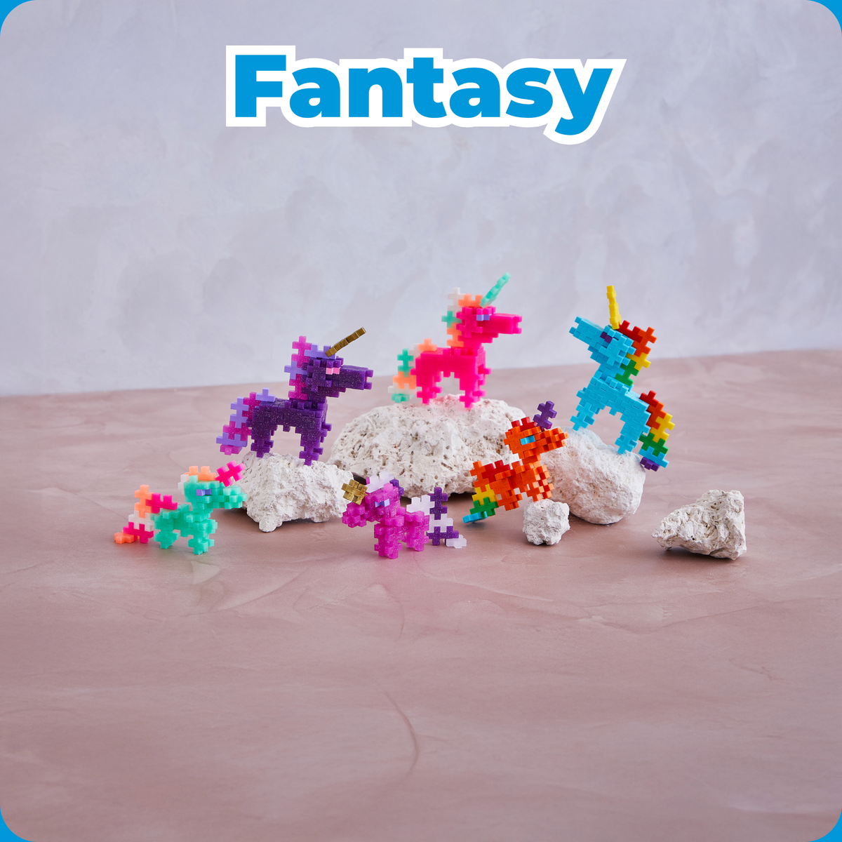 Shop by Theme - Fantasy: colorful Plus-Plus unicorn builds on a pink table